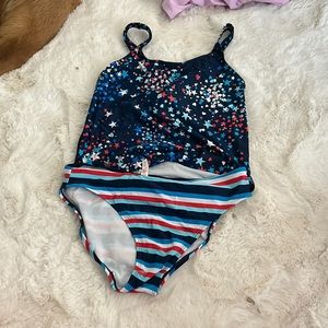 Super cute Fourth of July bathing suit, size 16 kids